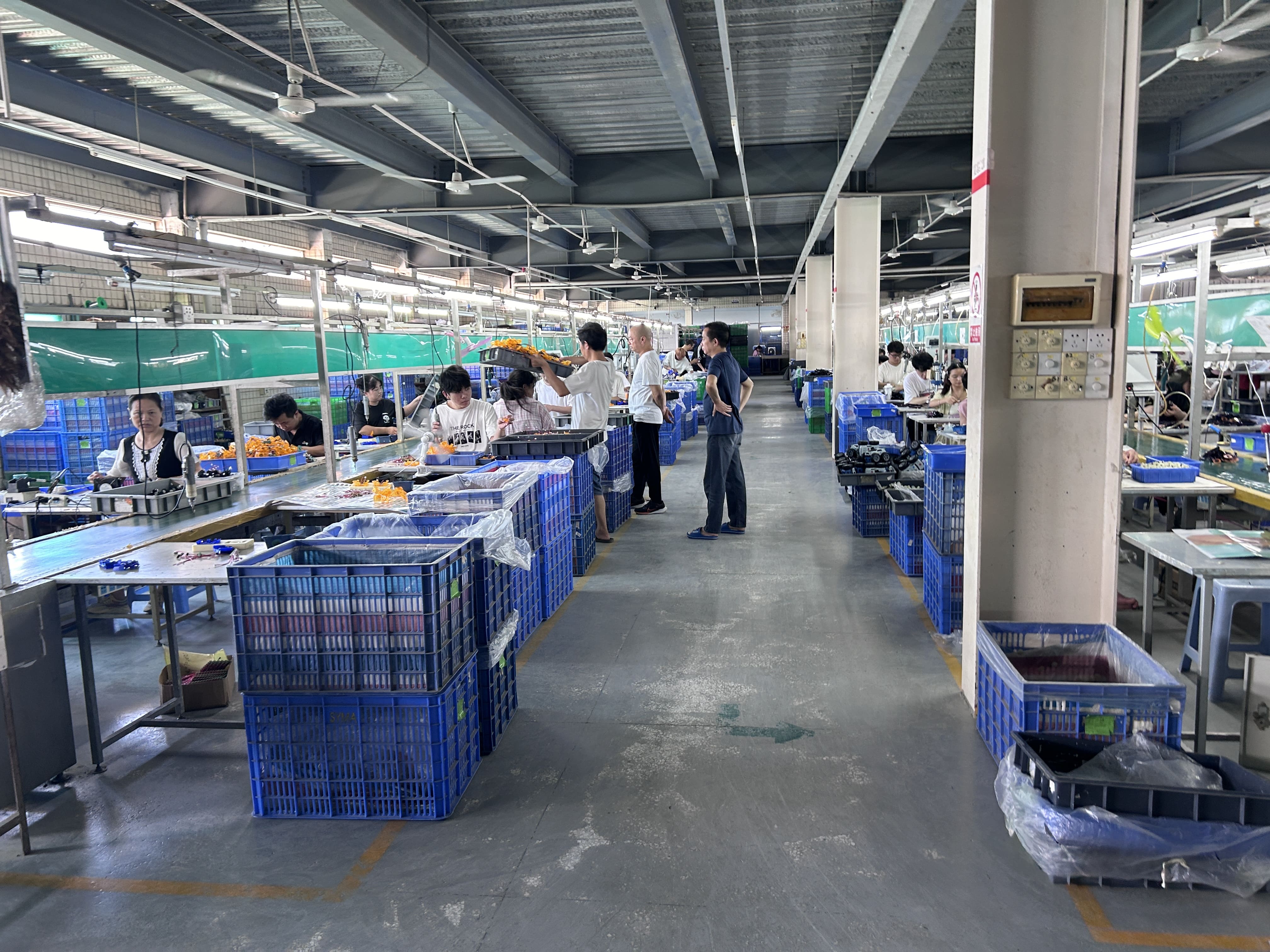 Workers Assembling Skytech Products
